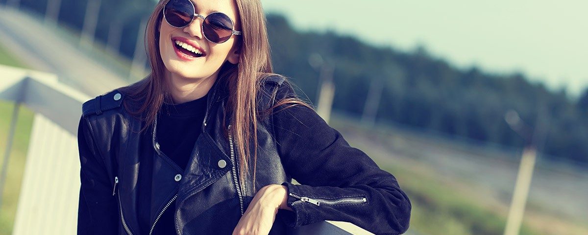 sober girl smiling outside