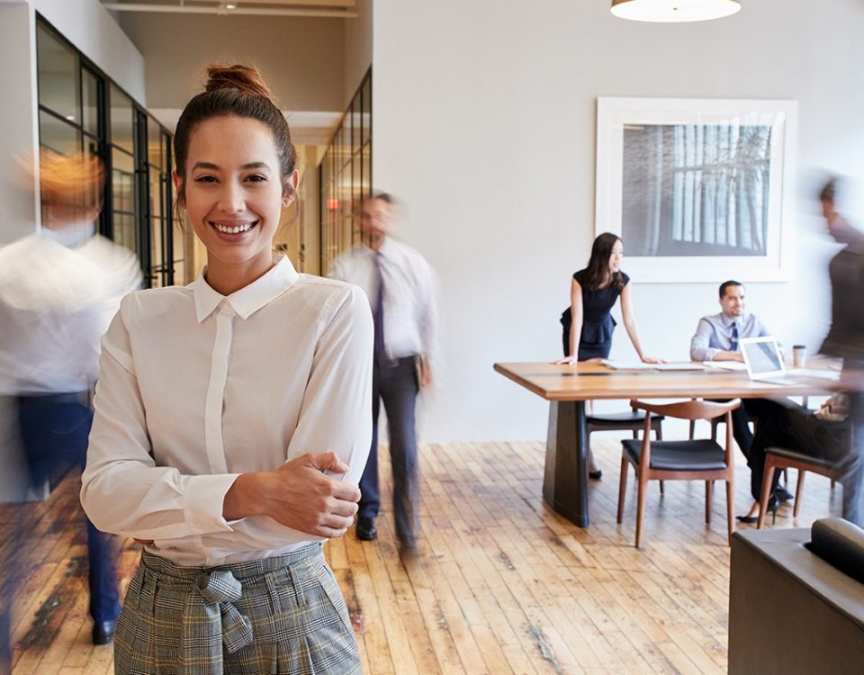 woman smiling in office