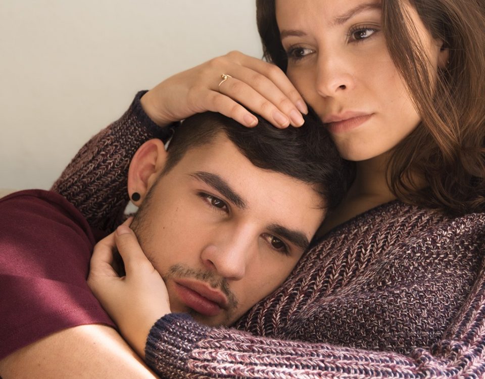 mother holding her adult son